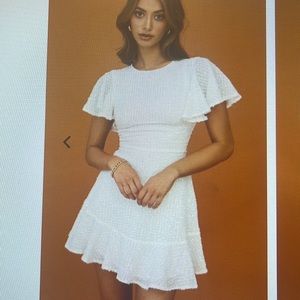 White Isabelle angel sleeve empire dress. Never worn, original packaging w/ tag